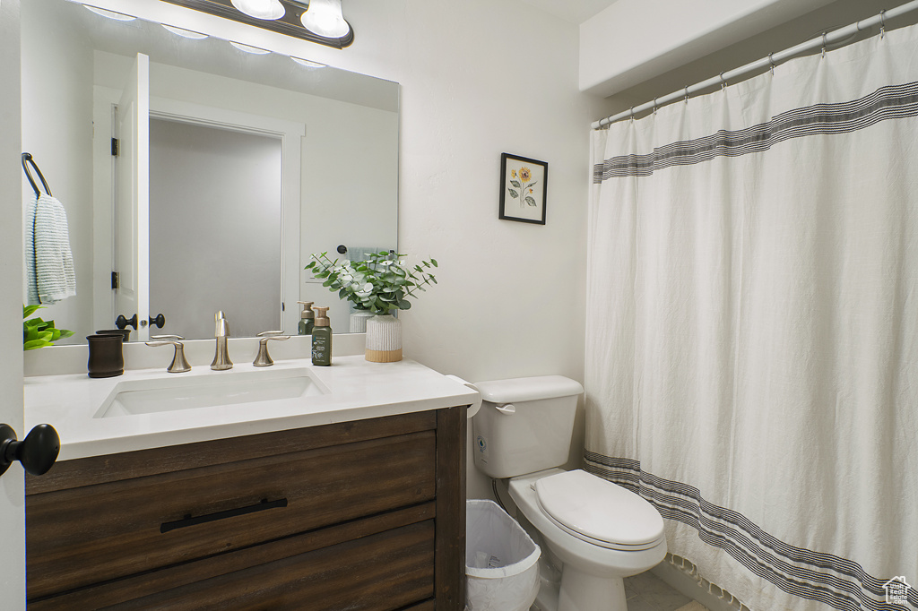 Bathroom with toilet and vanity