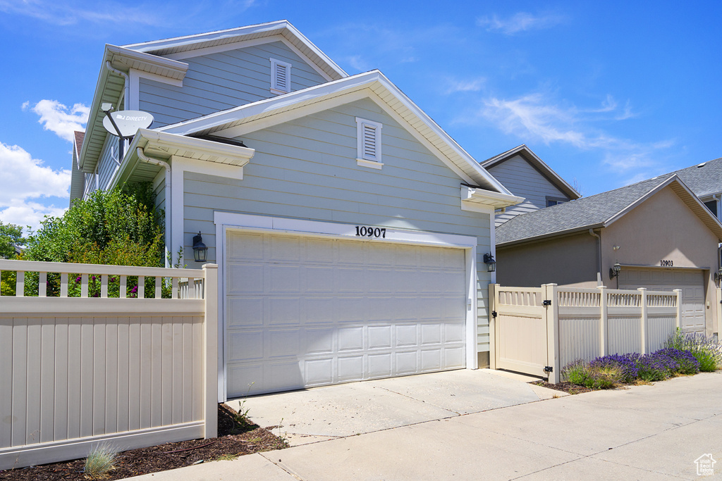 View of front of property with driveway