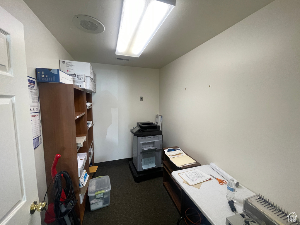 Office with dark carpet