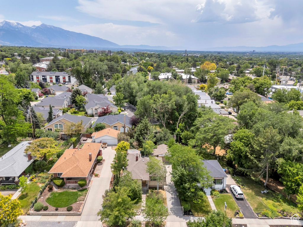 Aerial view of residential area with mountains