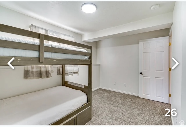Bedroom with carpet