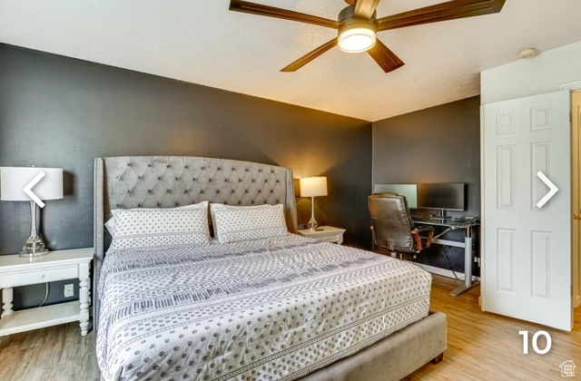 Bedroom with wood finished floors and ceiling fan