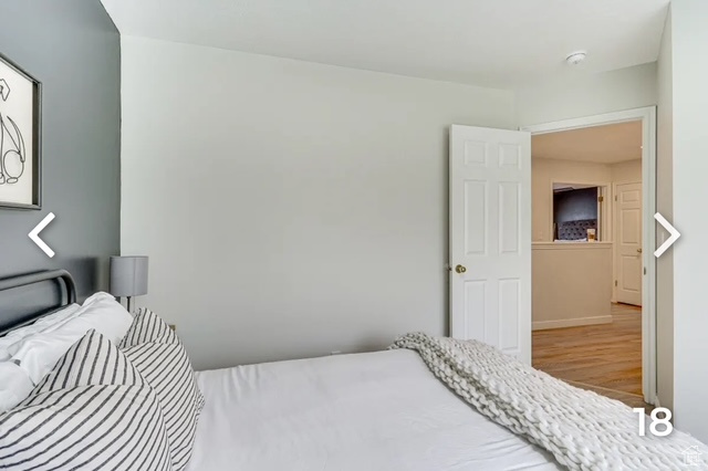 Bedroom with wood finished floors