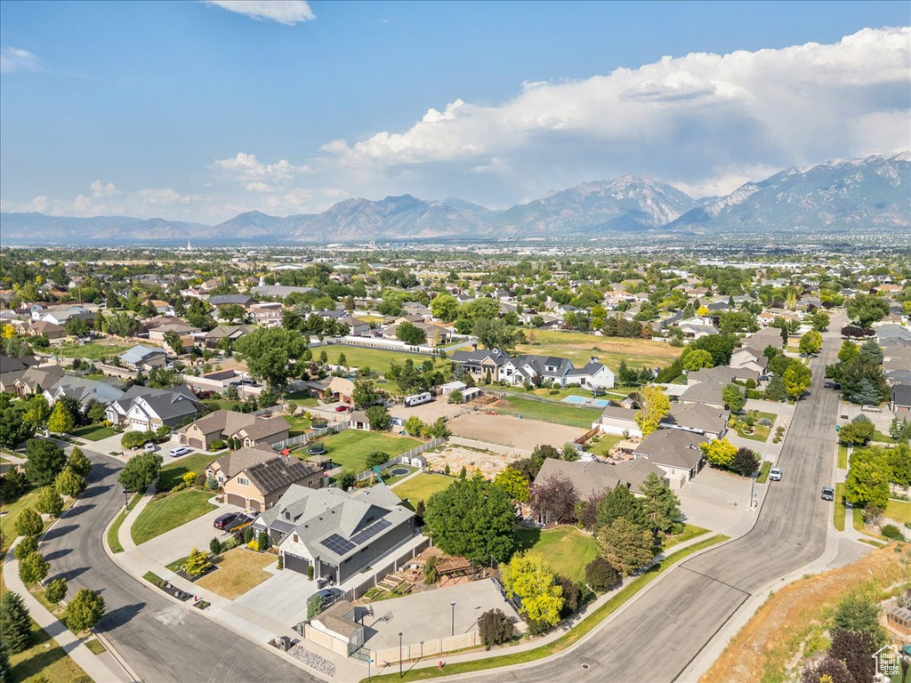 Aerial view of residential area with a mountainous background