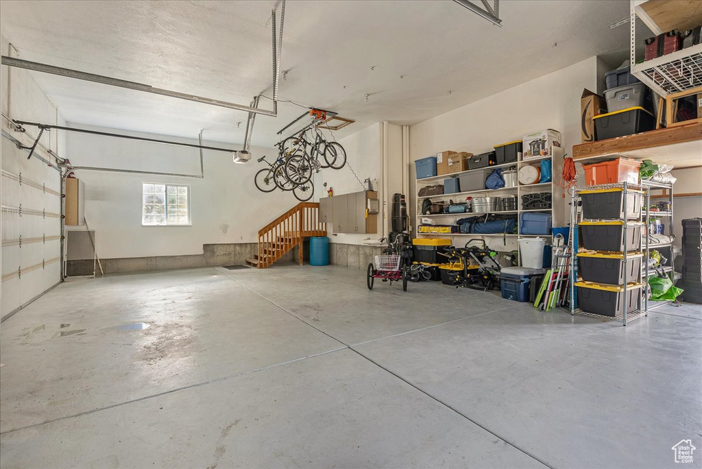 Garage featuring a garage door opener