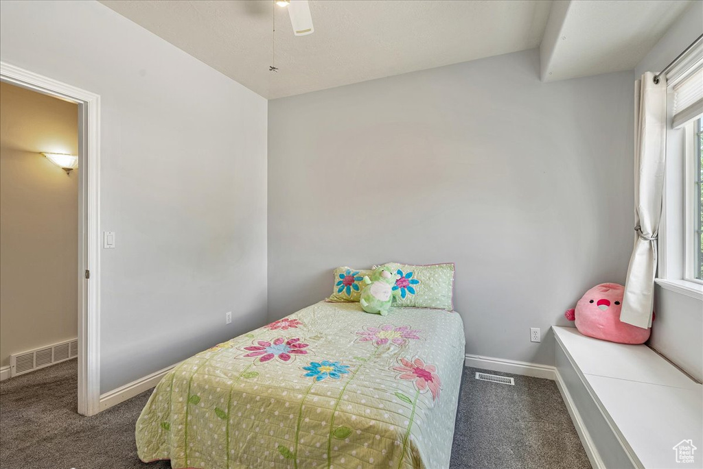 Bedroom with carpet floors and ceiling fan