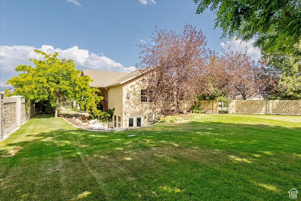 View of fenced backyard