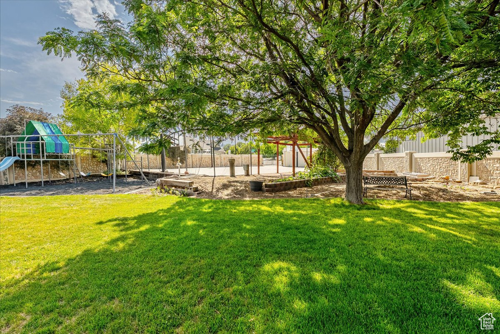 View of yard with a playground
