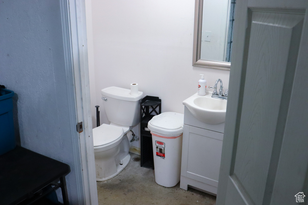 Bathroom with vanity and toilet