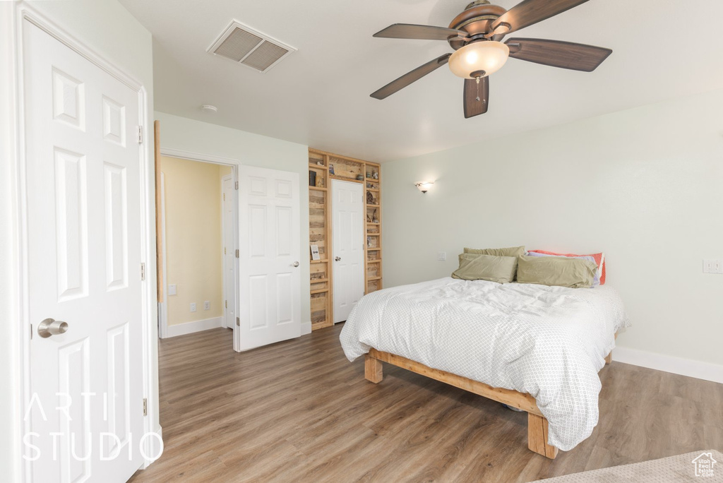 Bedroom featuring light wood-style floors and ceiling fan