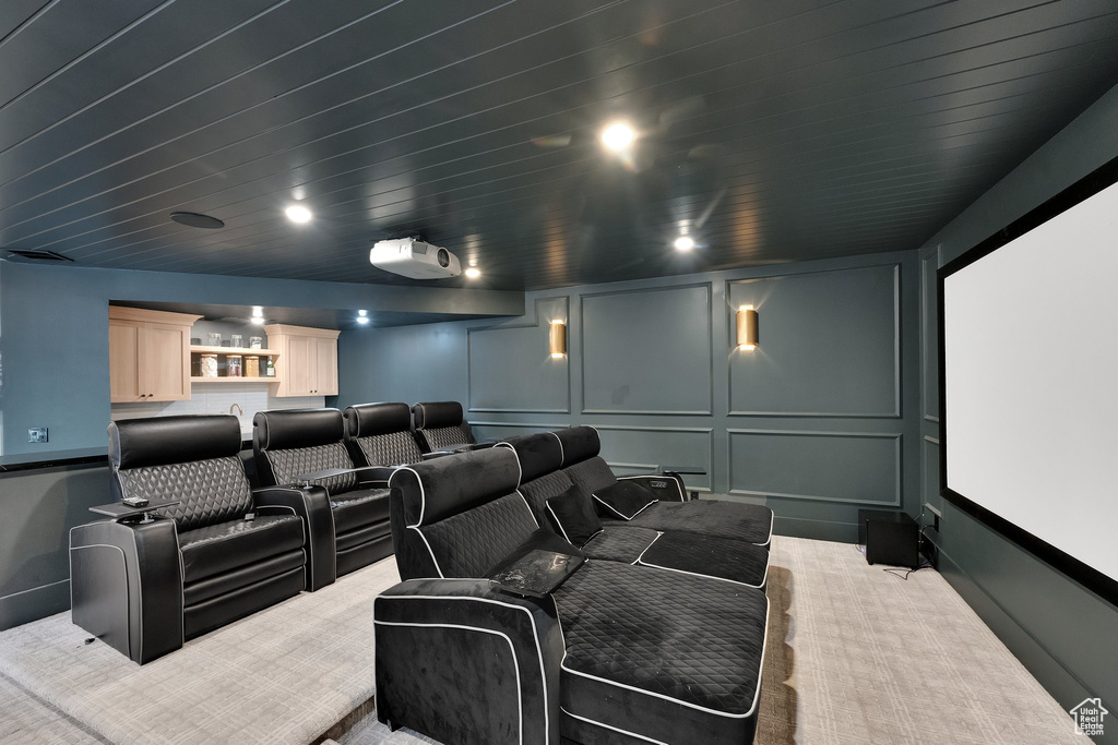 Cinema with a decorative wall and carpet floors