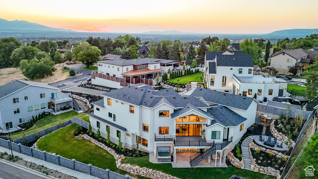 Aerial view at dusk of a mountain view and a residential view