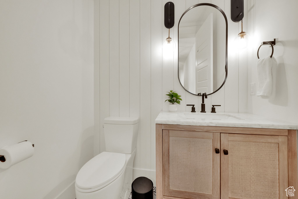 Bathroom with toilet and vanity