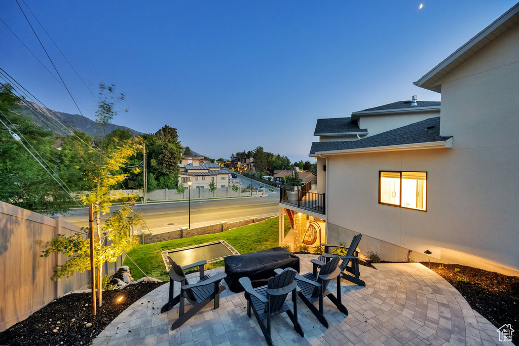 View of patio / terrace featuring an outdoor fire pit