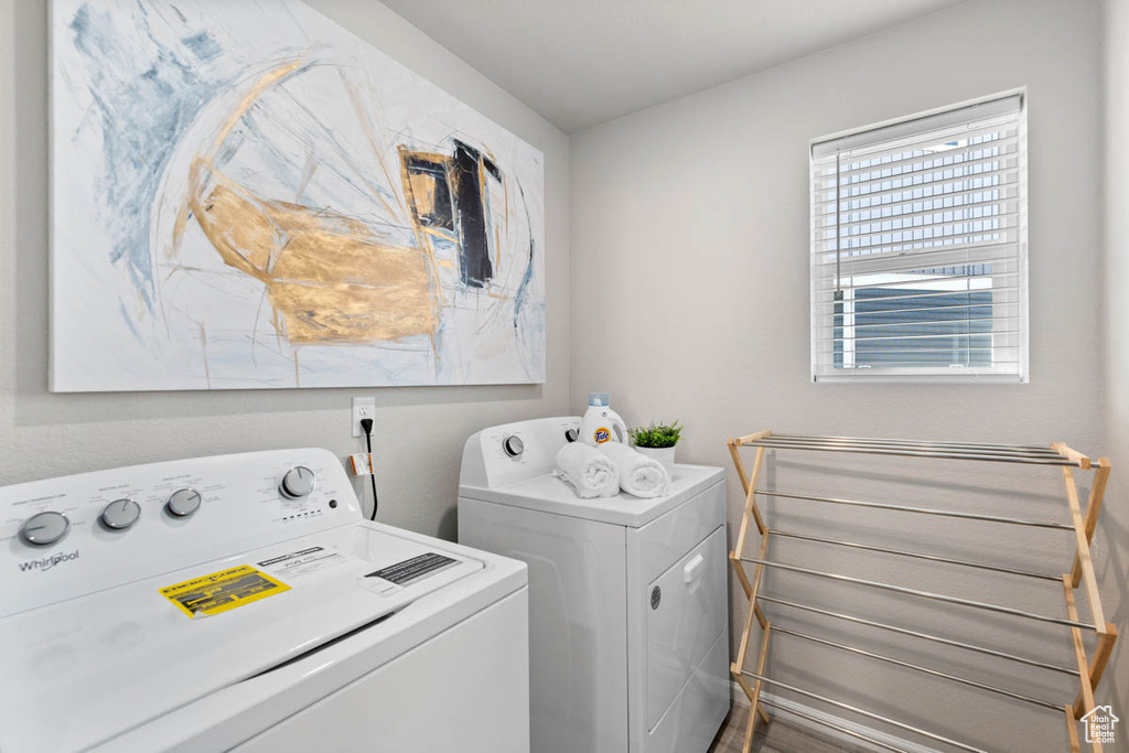 Laundry room with washing machine and dryer