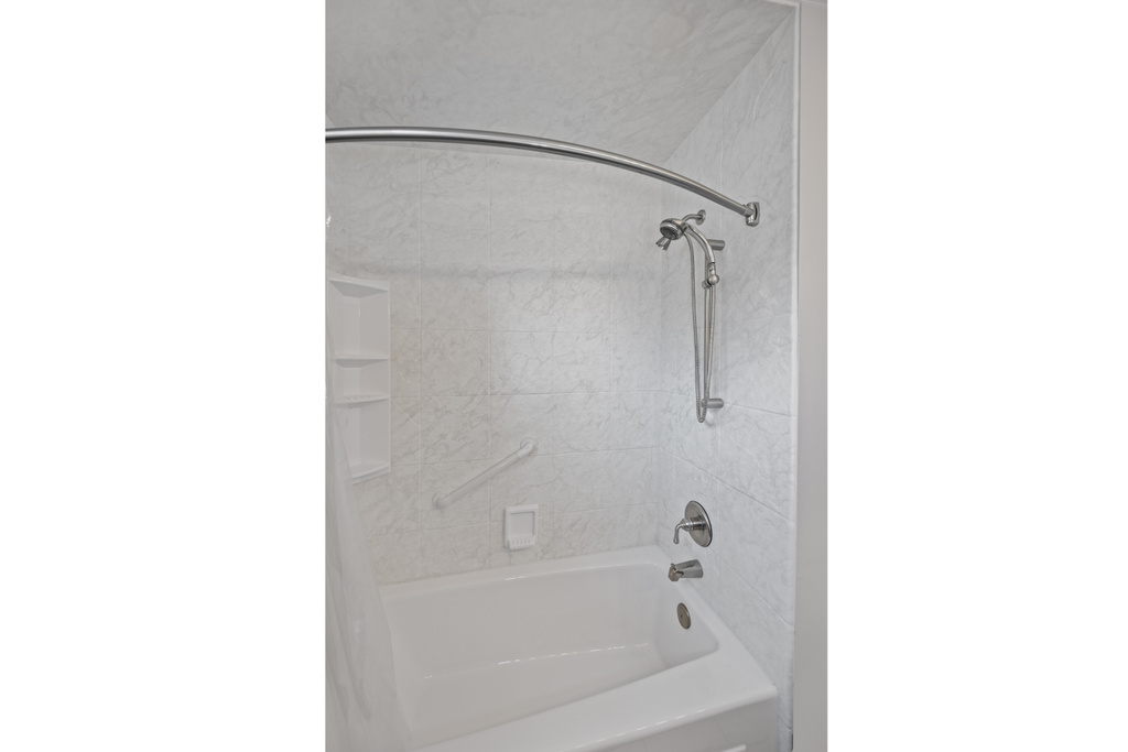 Bathroom with bathtub / shower combination