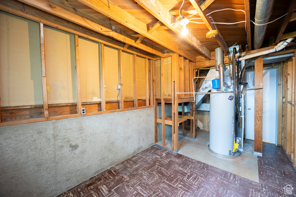 Unfinished basement with water heater