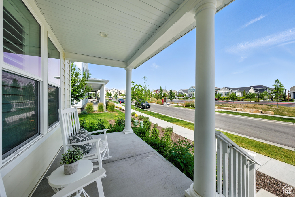 Porch featuring a residential view