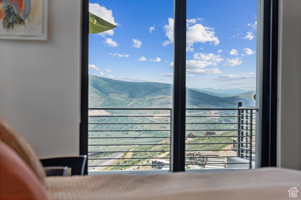Bedroom featuring a mountain view