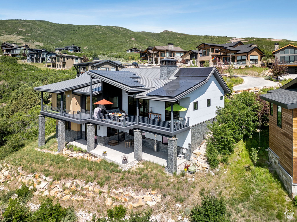 View of subject property featuring mountains