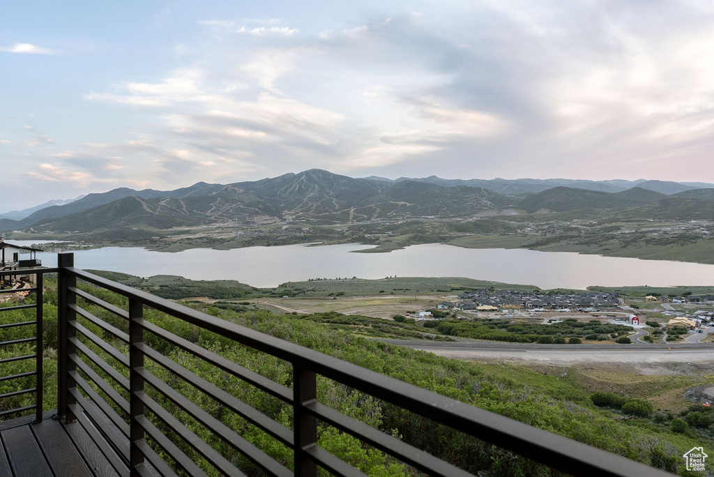 View of mountain backdrop featuring a large body of water