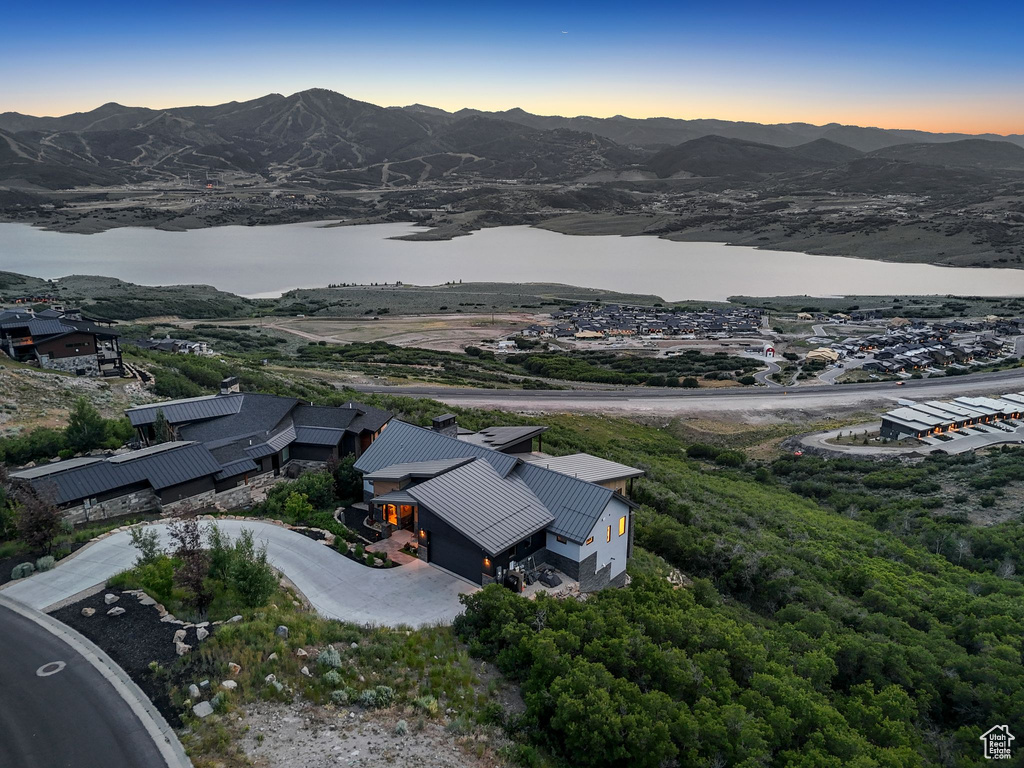 Aerial view at dusk of a water and mountain view