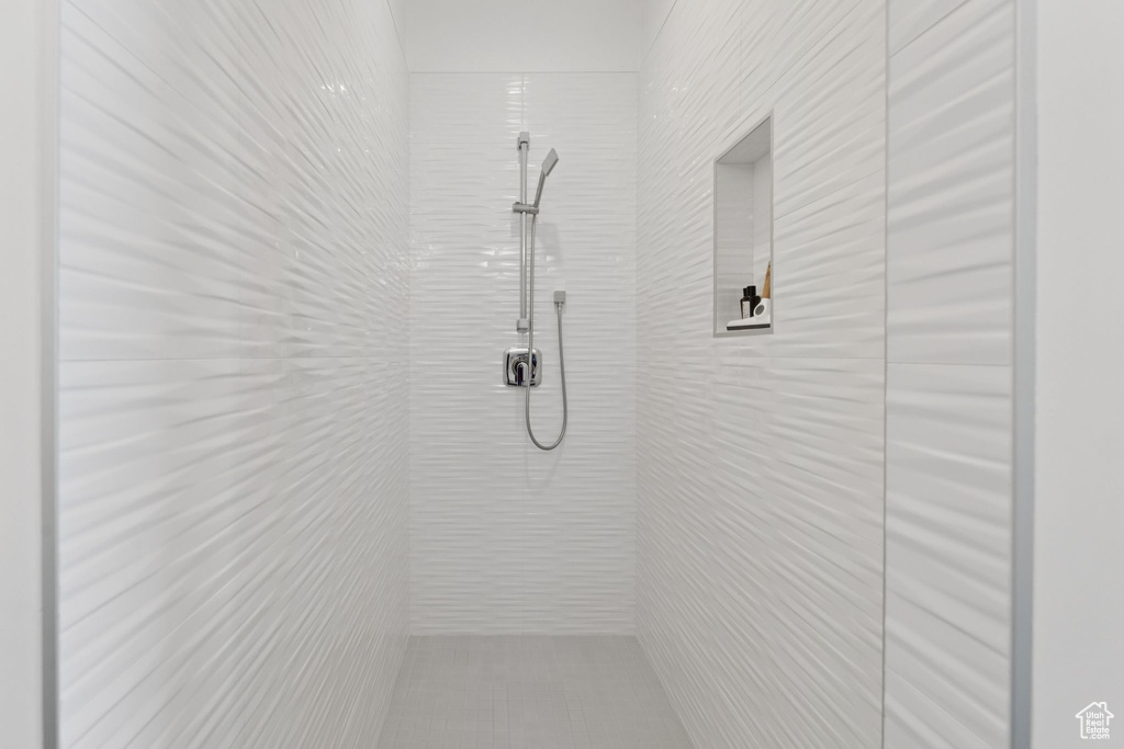 Bathroom view of tiled shower