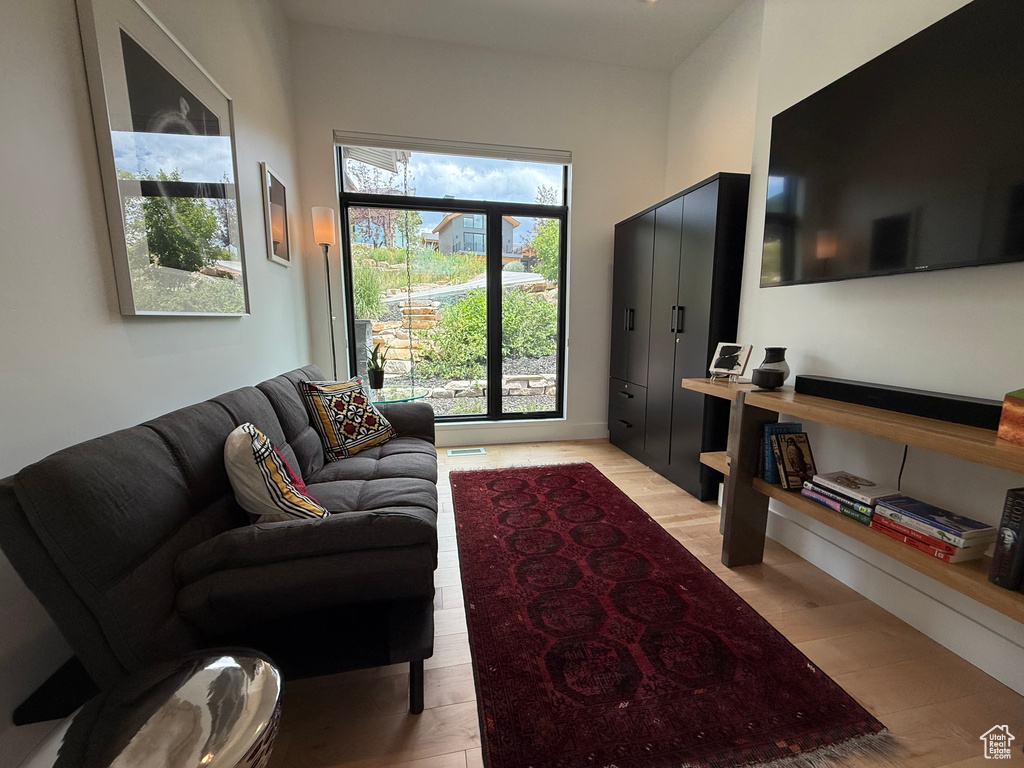 Living area featuring light wood-style flooring