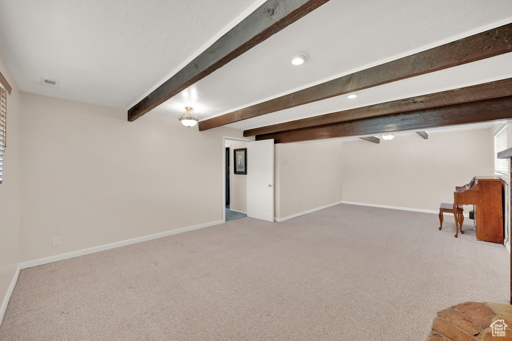 Basement featuring light carpet and recessed lighting