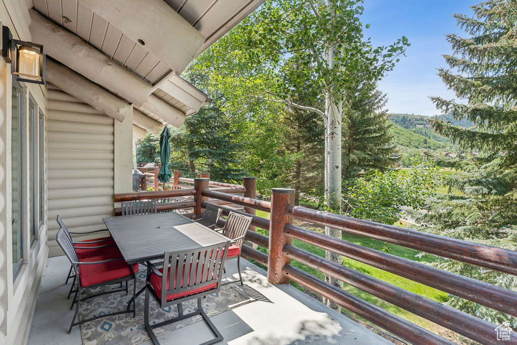 View of patio with outdoor dining area