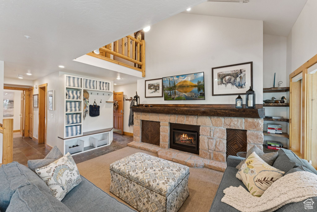 Living room featuring a fireplace and recessed lighting