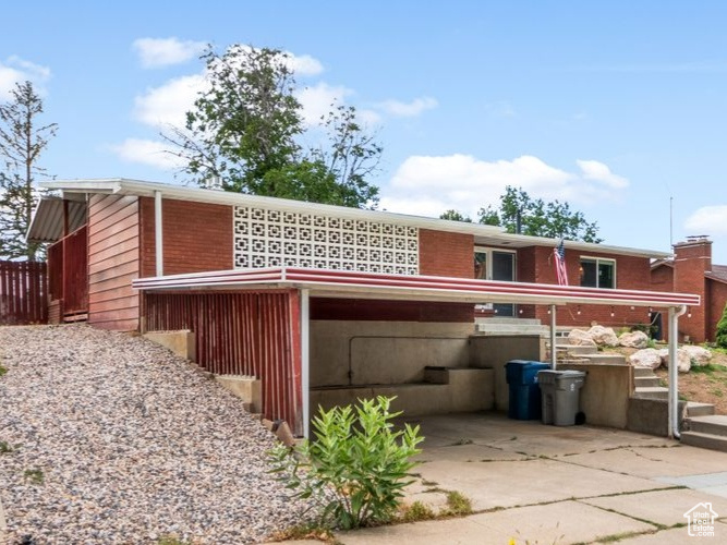 View of front of house featuring a mountain view