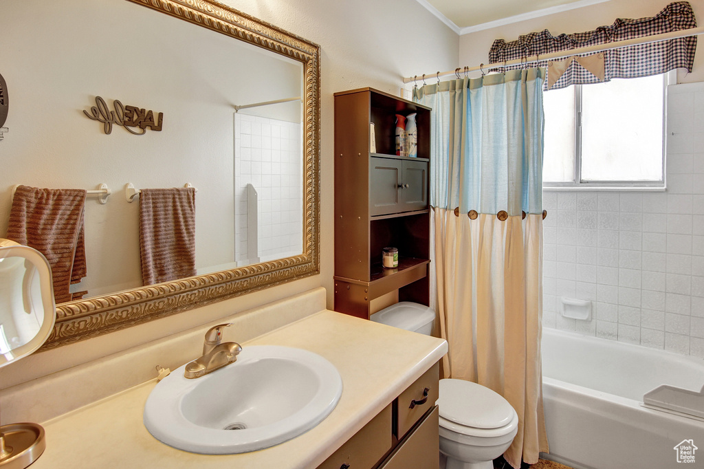 Full bathroom featuring vanity and shower / tub combo