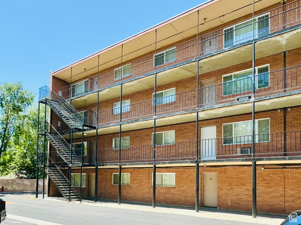 View of apartment building / complex with stairs