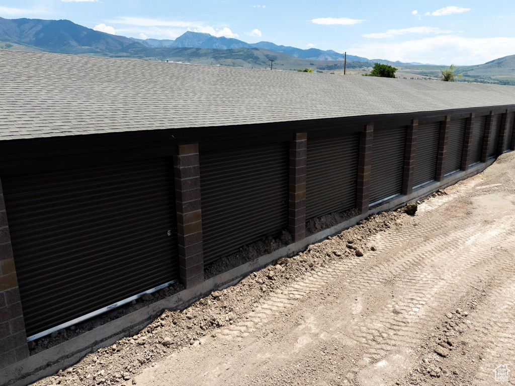 Garage featuring a mountain view