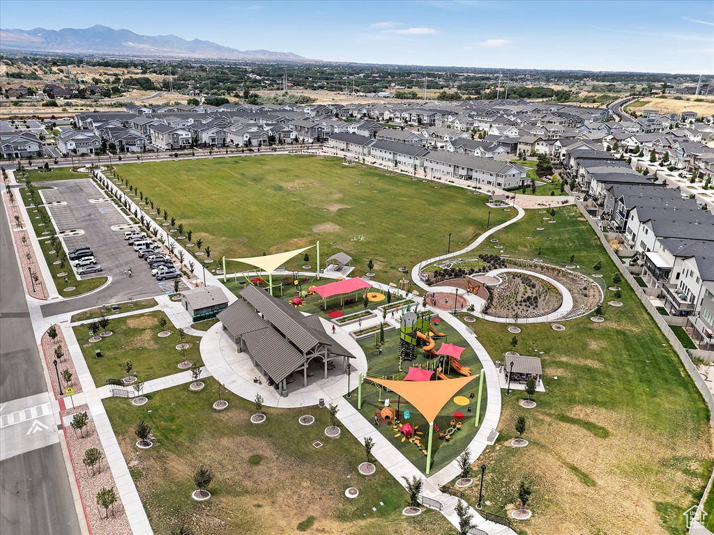 Aerial view of residential area featuring mountains