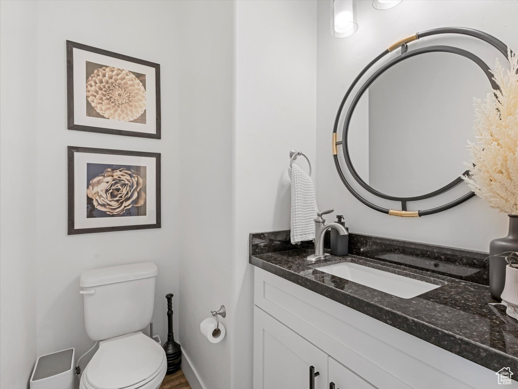 Bathroom with vanity and toilet