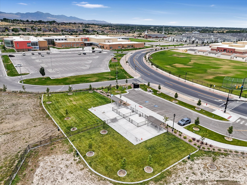 Aerial view of residential area featuring a mountain backdrop