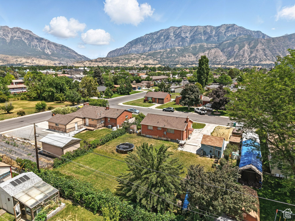 Aerial view of residential area featuring mountains