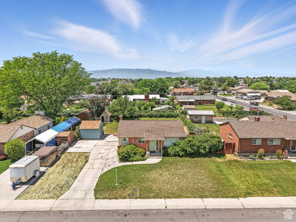 Aerial perspective of suburban area featuring mountains