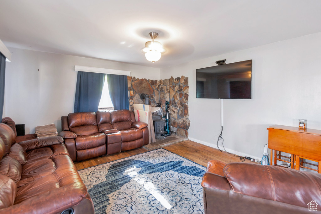 Living room featuring wood finished floors and baseboards