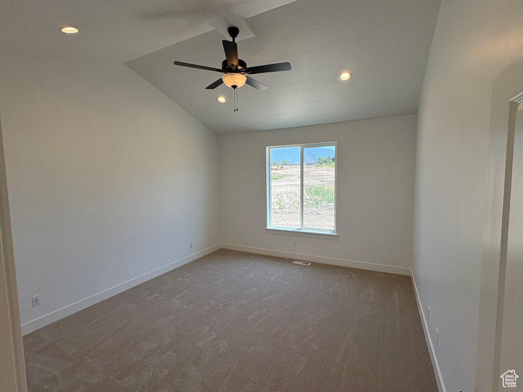 Unfurnished room featuring recessed lighting, lofted ceiling, carpet, and a ceiling fan