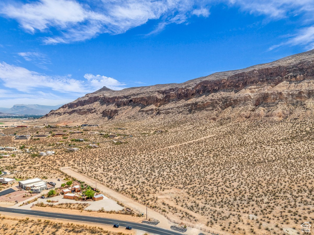View of mountain backdrop featuring a desert landscape