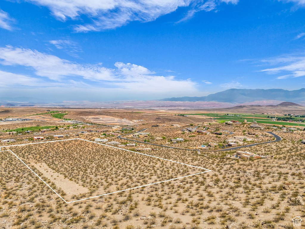 Overview of rural landscape featuring property parcel outlined and a mountain backdrop