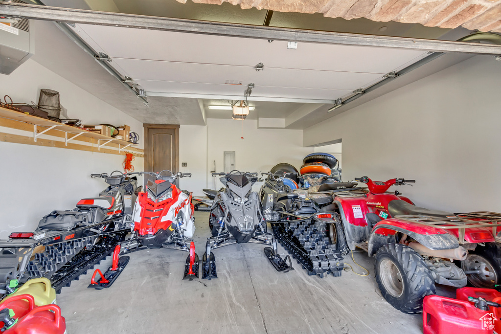 Garage with a garage door opener and electric panel