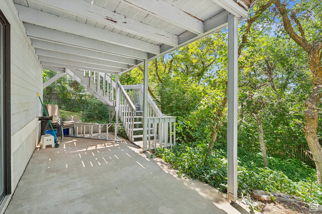 View of patio featuring stairs
