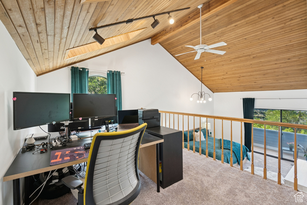 Carpeted office with wooden ceiling, track lighting, ceiling fan, and a chandelier