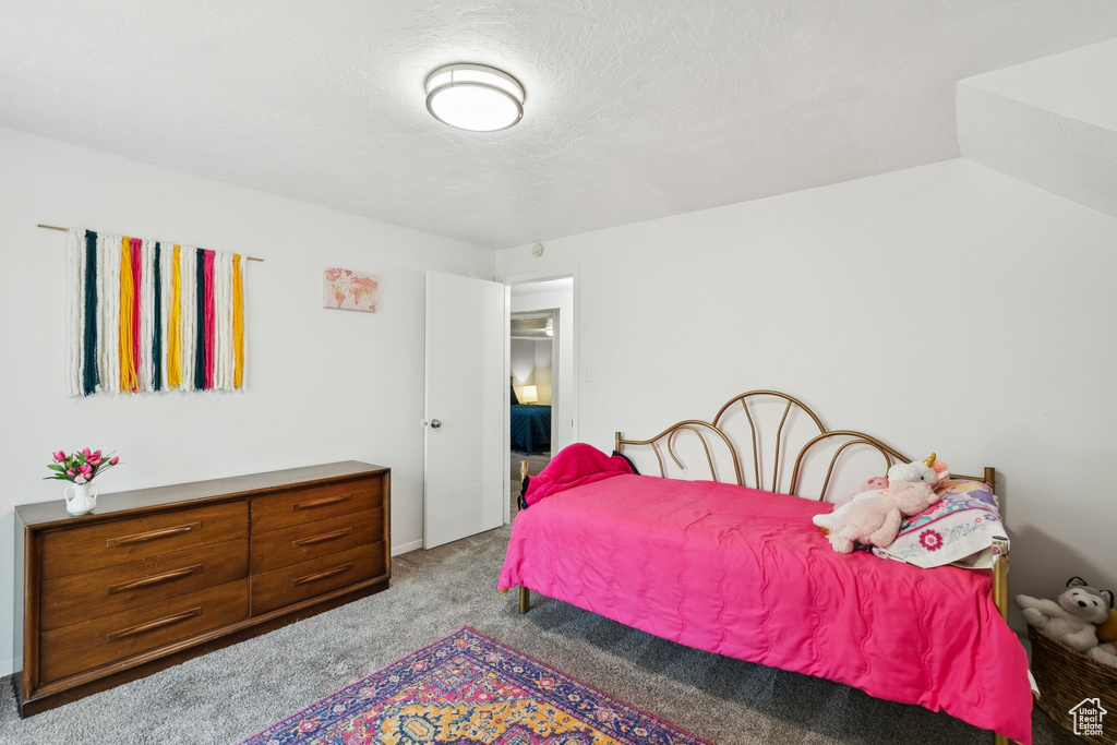 Bedroom featuring carpet flooring