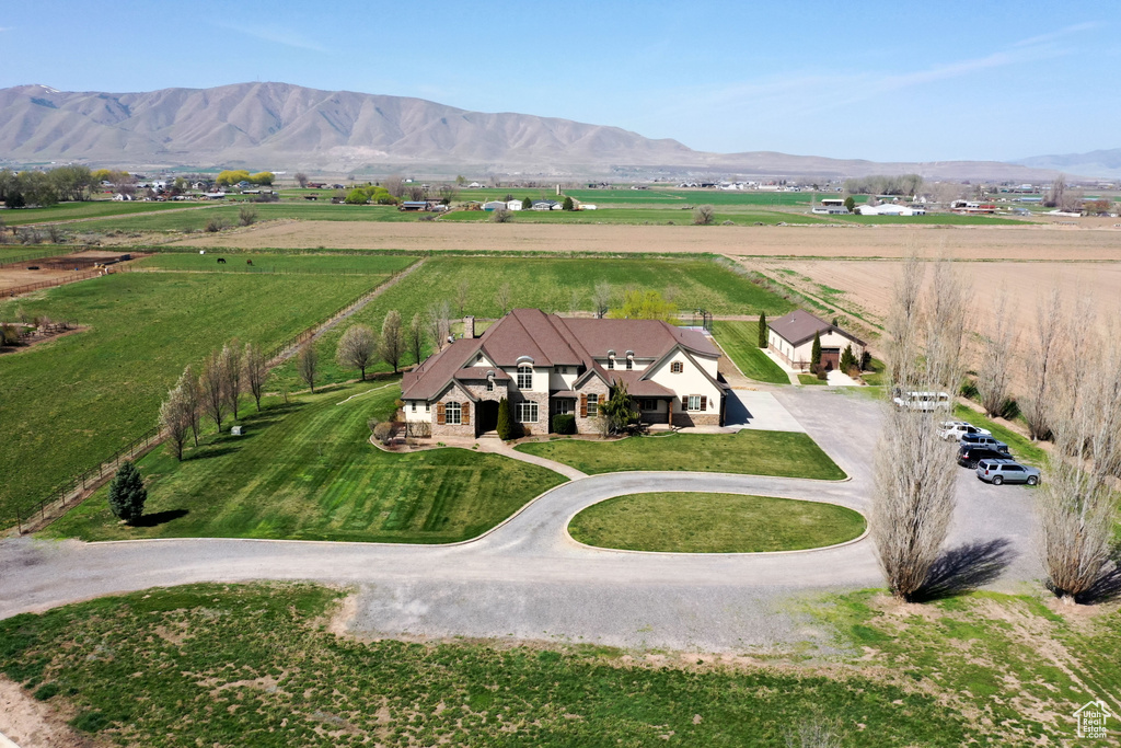 Aerial view of sparsely populated area featuring a mountain backdrop