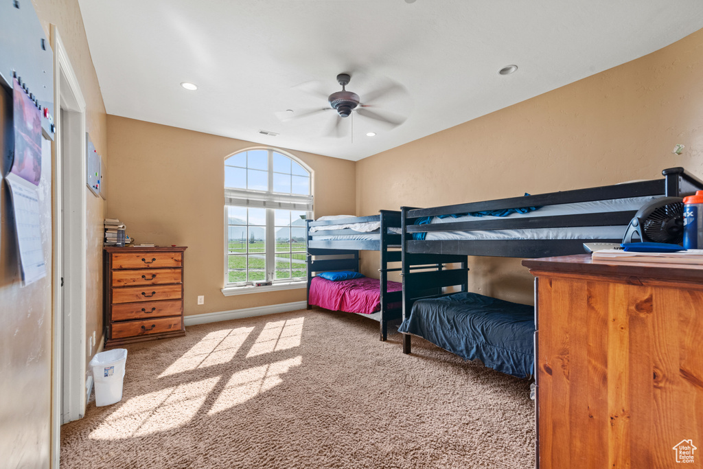 Bedroom featuring carpet floors, a ceiling fan, and recessed lighting